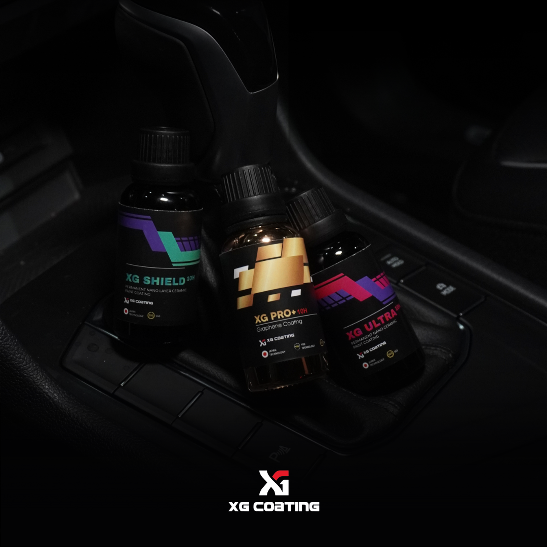 Product photoshoot XG Coating bottles in car interior